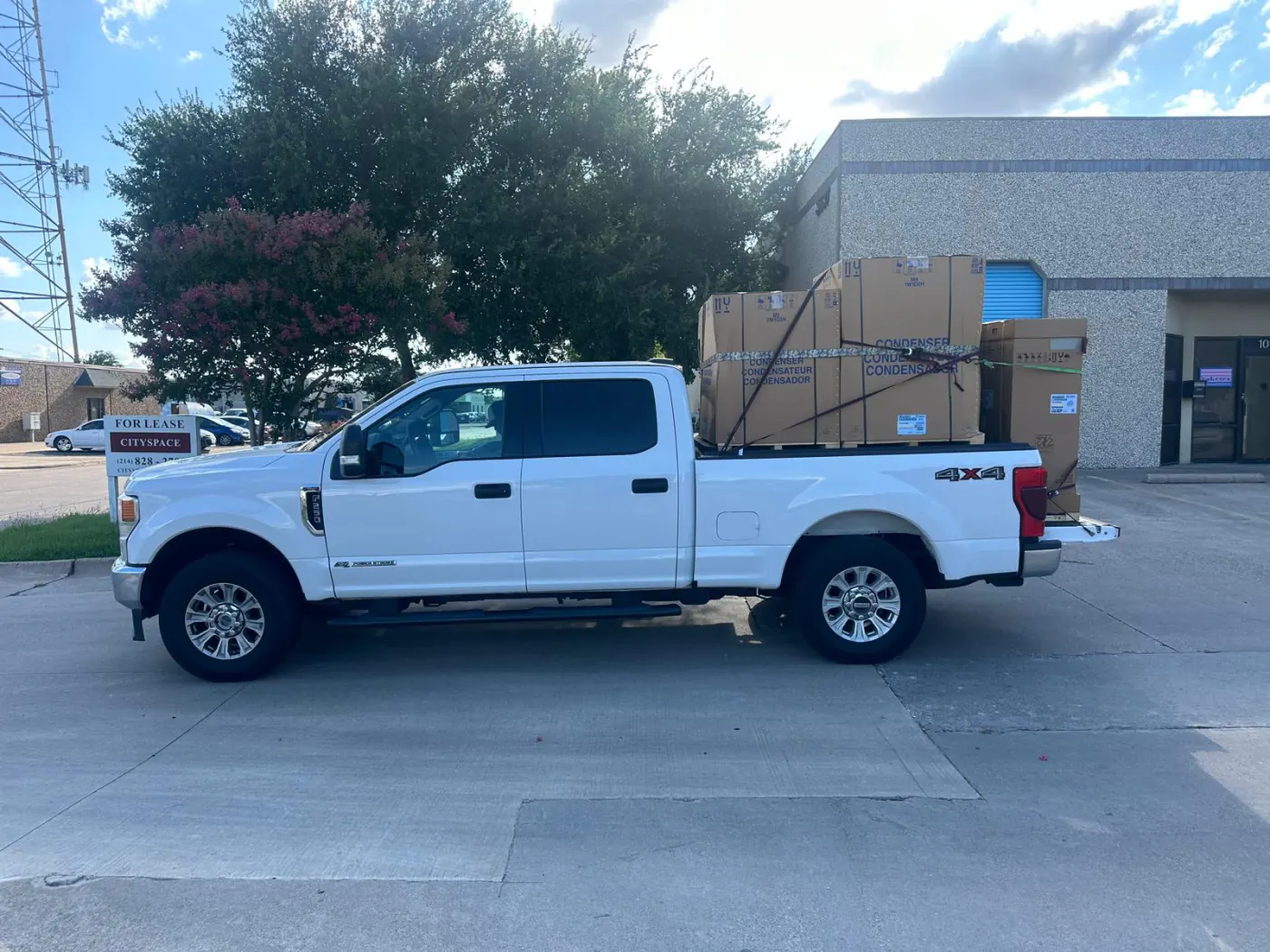 A work truck loaded with materials and equipment